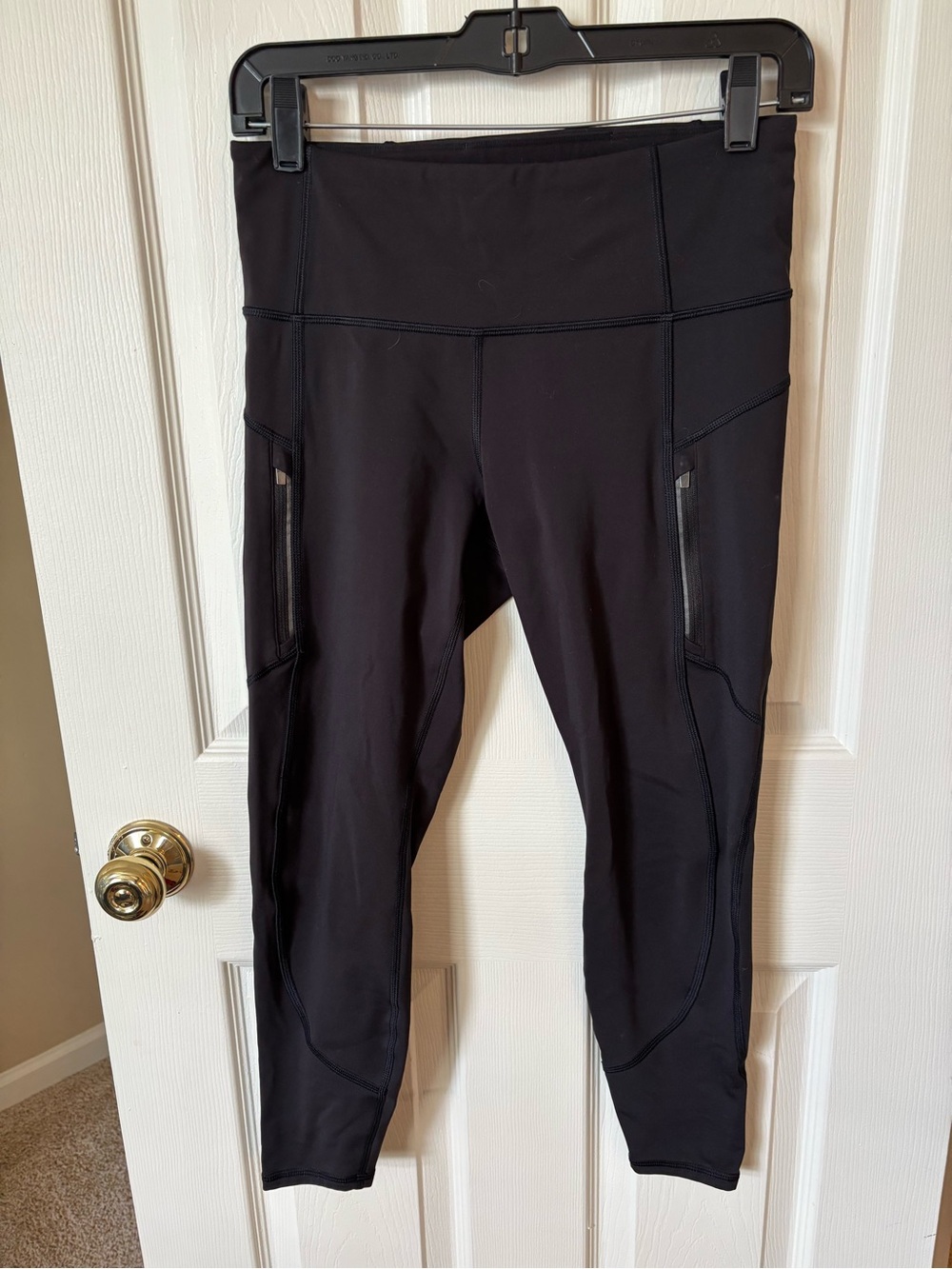 Athleta Black High-Rise Performance Leggings with Side Zip Pockets